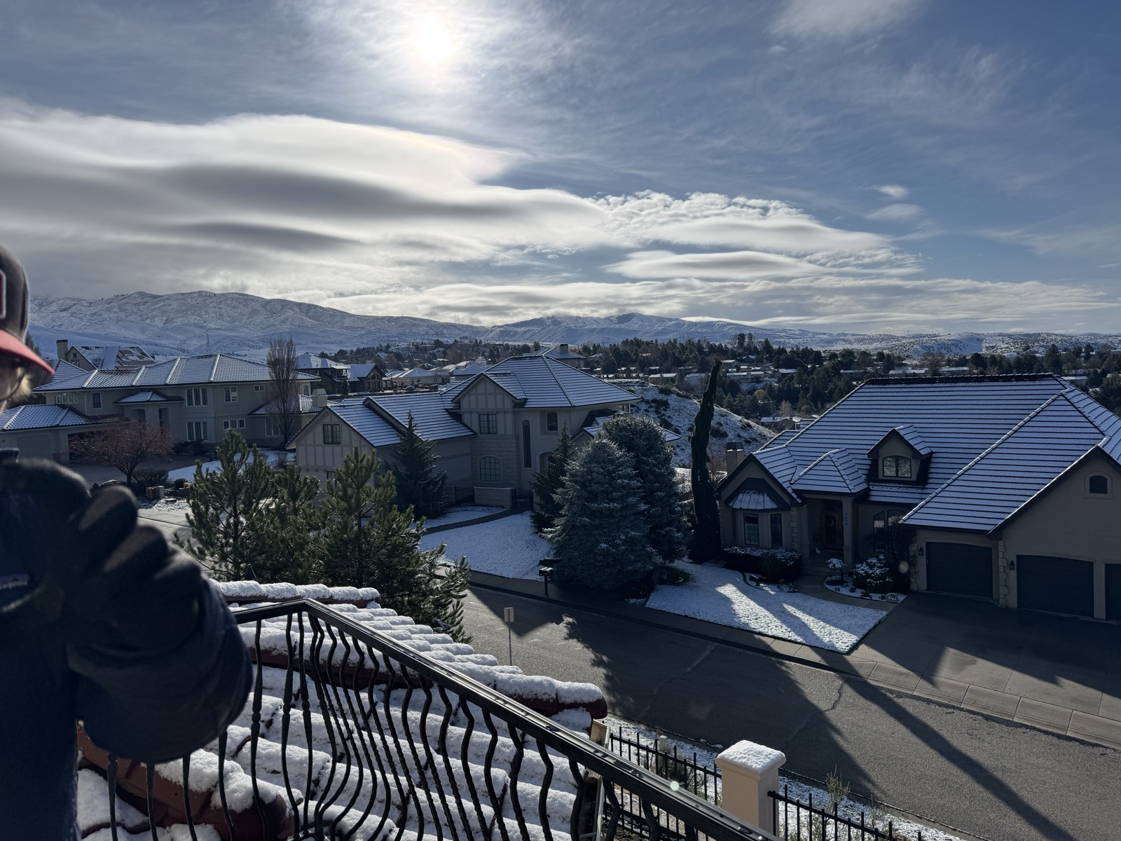 Winter view over the valley from a hillside home terrace