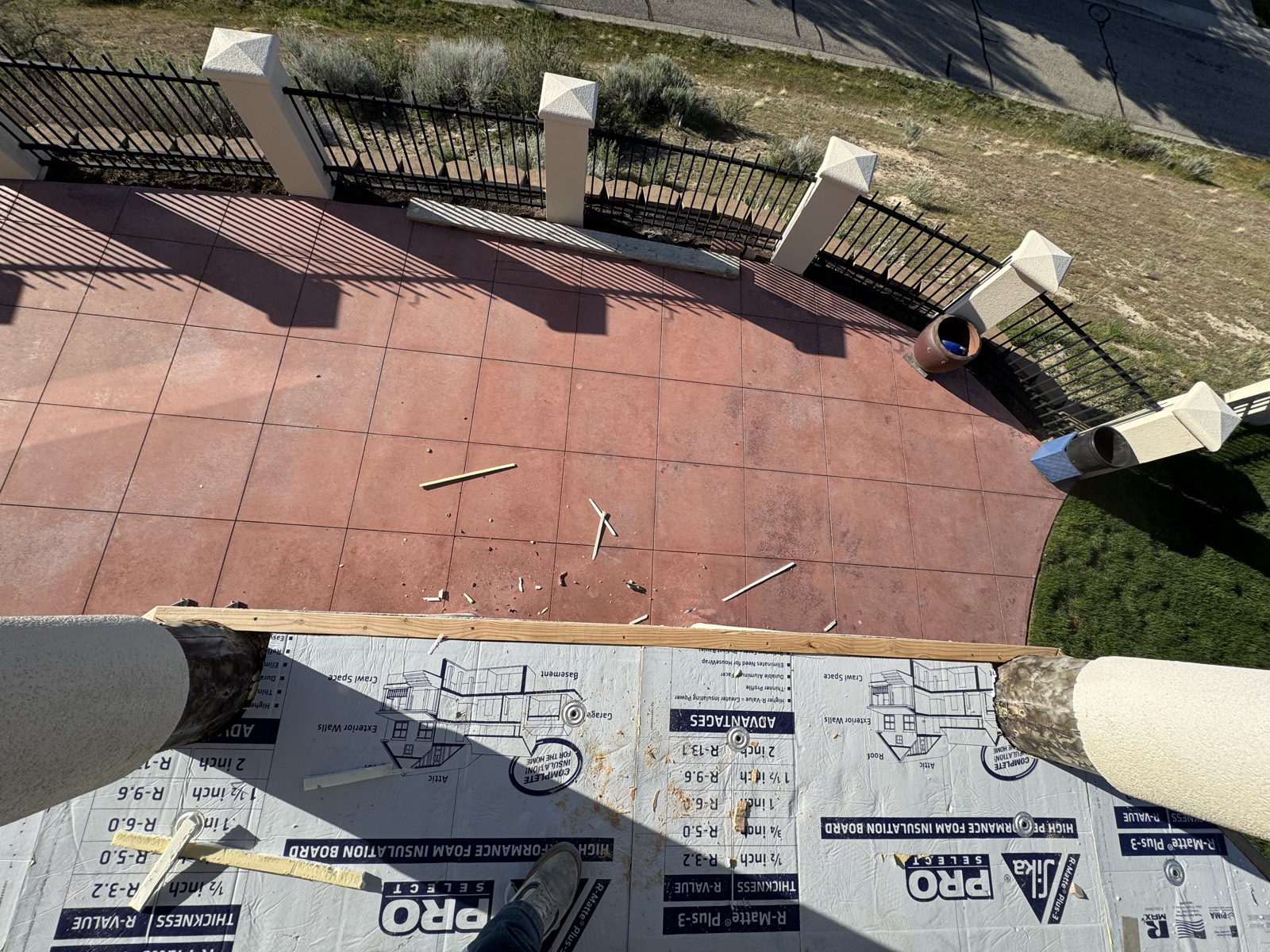 Terrace waterproofing and tile preparation underway