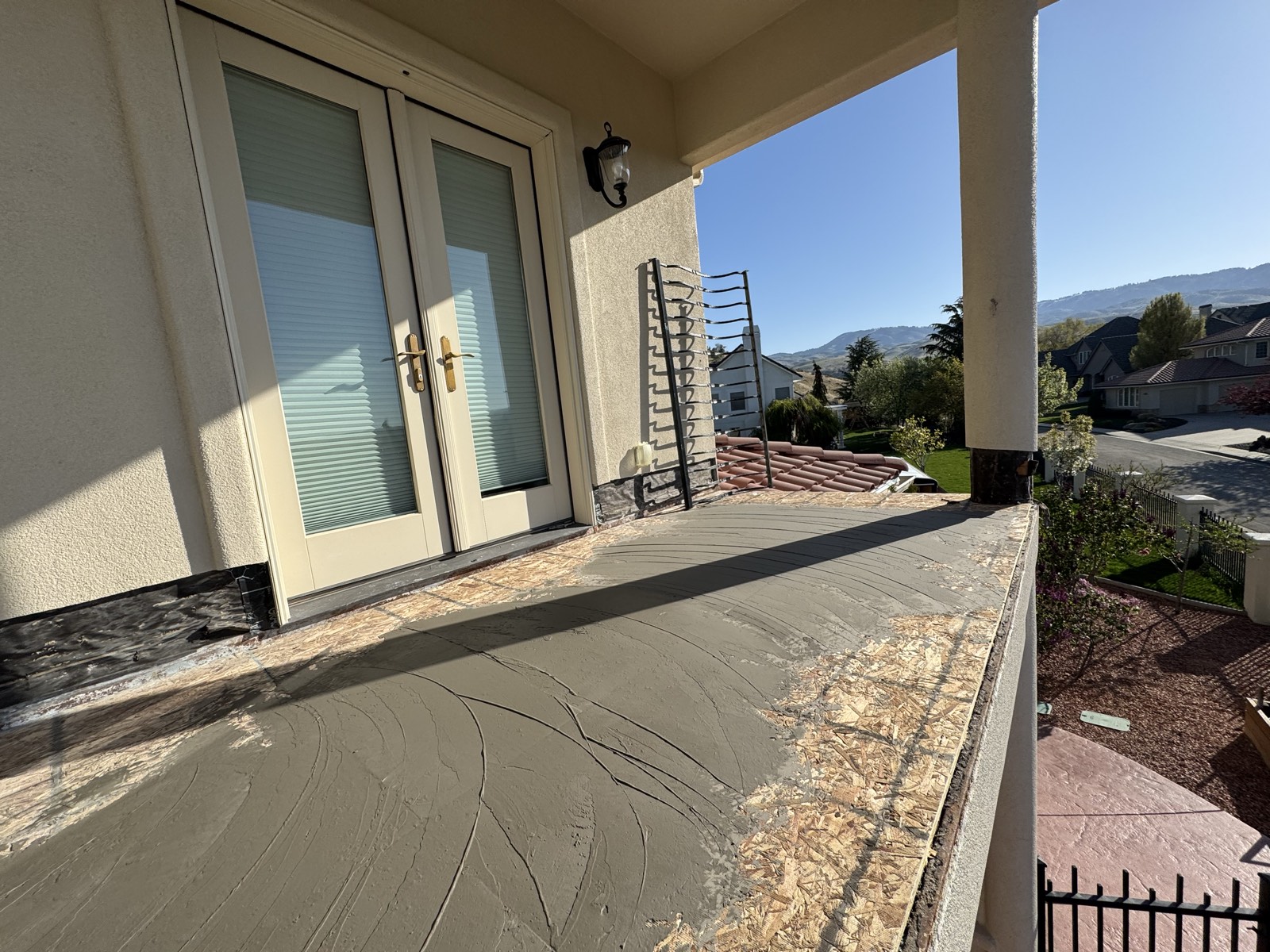 Finished terrace corner with new door and railing