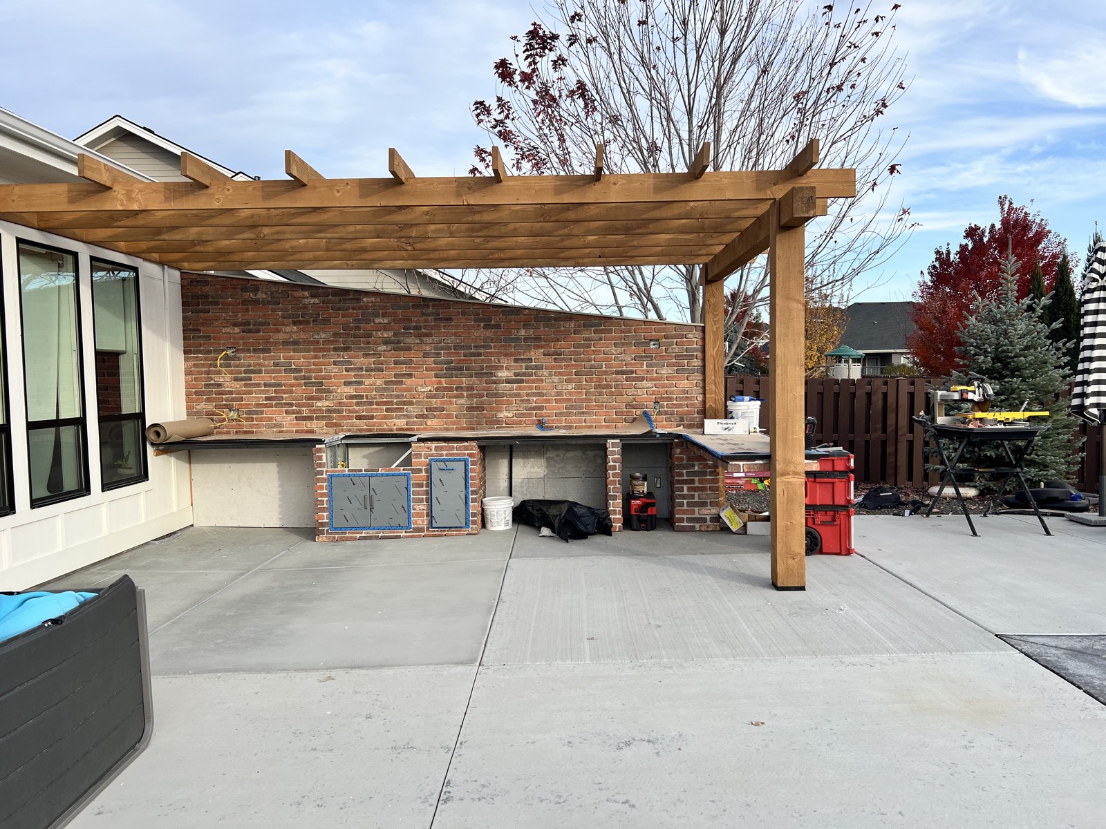 Outdoor kitchen counters and brick surround in the Outdoor Living Retreat