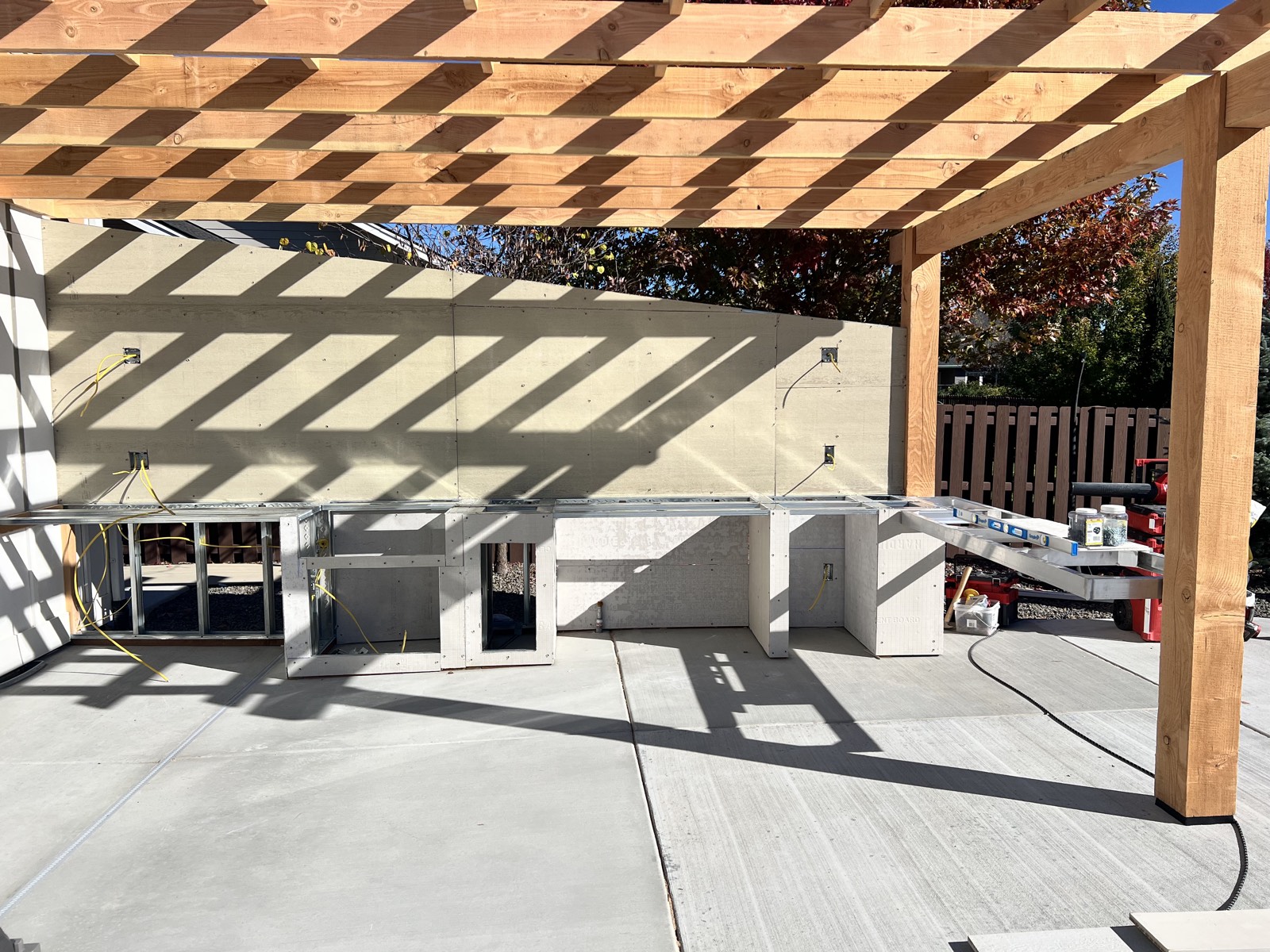 Backyard outdoor living addition by Thunder Mountain Homes