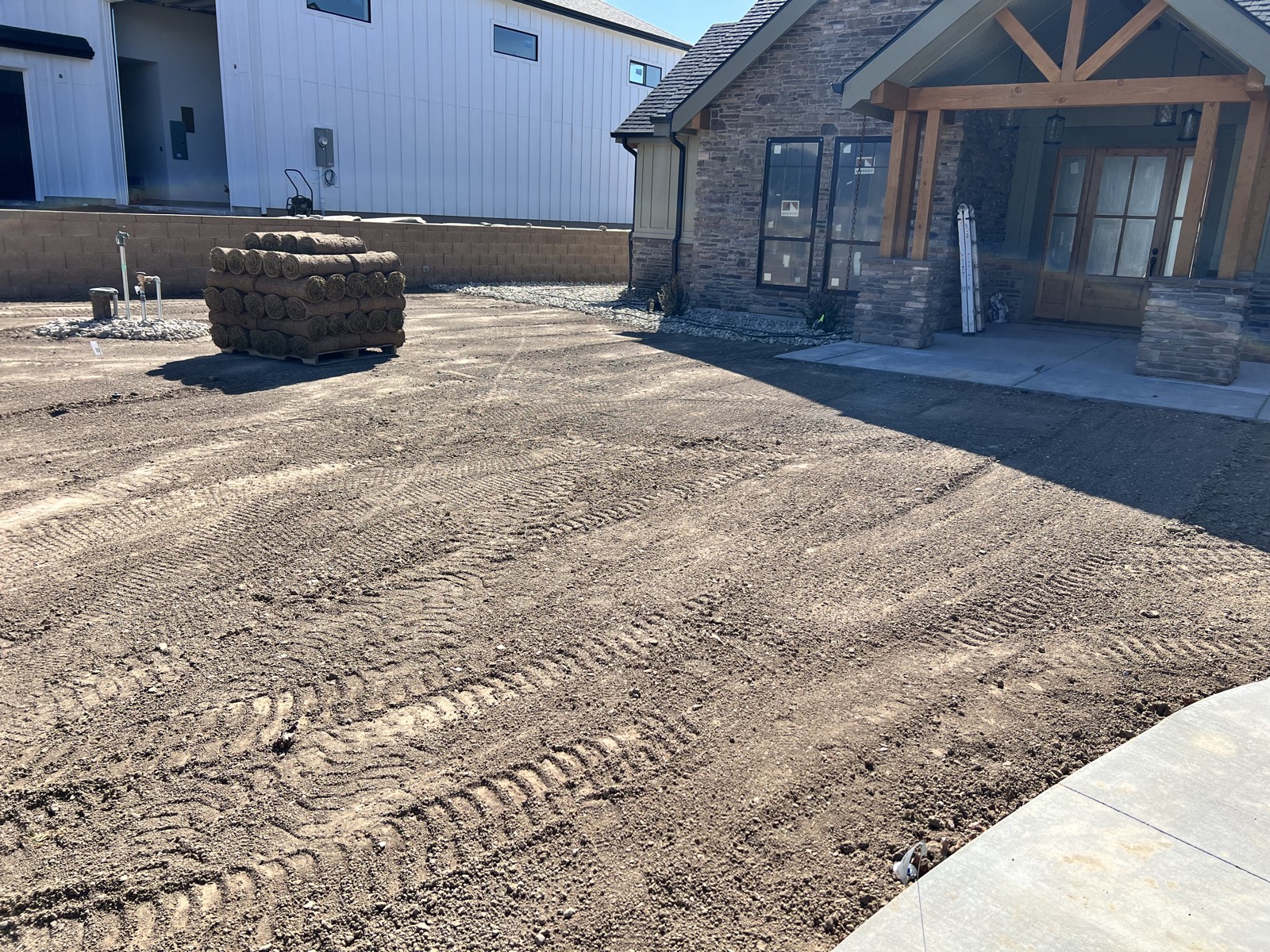 Timber-post courtyard entry of a custom craftsman home